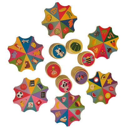 Stacked wooden token discs from matching game set