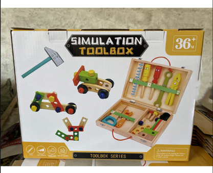 Simulation Toolbox open wooden case with toy tools and building pieces — wrench, pliers, screwdriver, ruler, hammer